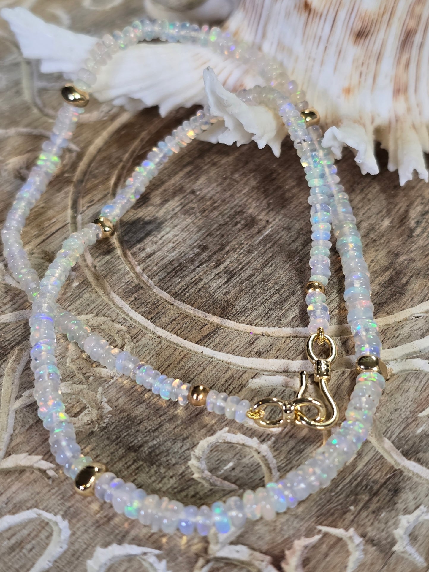 Shimmering Symphony: Ethiopian Opal Necklace with Gold Accents